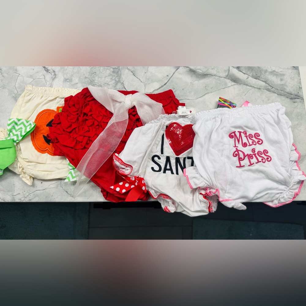 Bundle of bloomers 0-6 months 6-18 months. Never worn. 2 pairs still have tags!